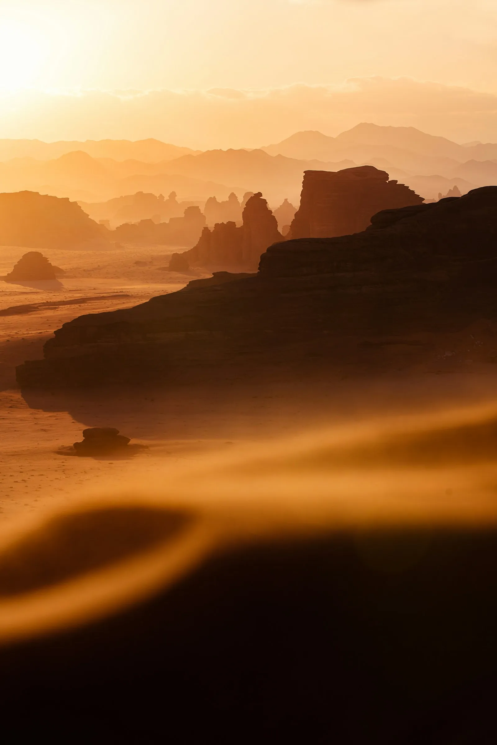 Warm light crossing a wide desert landscape